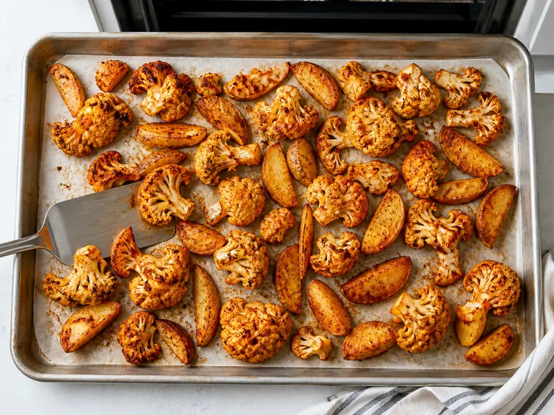 Roasted cauliflower and potatoes with an even smoked paprika coating - chipotle powder substitutes | KnowTheSpices