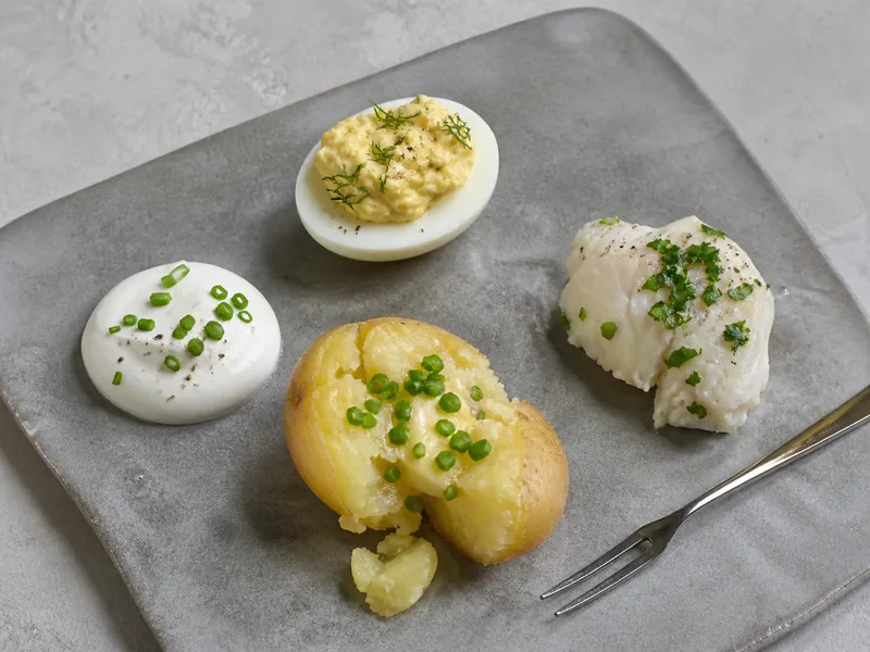 Dip, eggs, potatoes, and fish finished with different green herbs - chive substitutes | KnowTheSpices