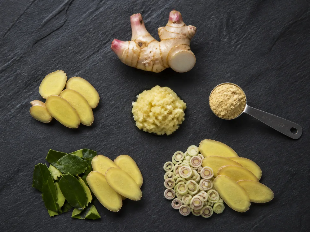 Frozen galangal, galangal powder, young ginger, makrut lime leaf, and lemongrass in measured portions - galangal substitutes | KnowTheSpices