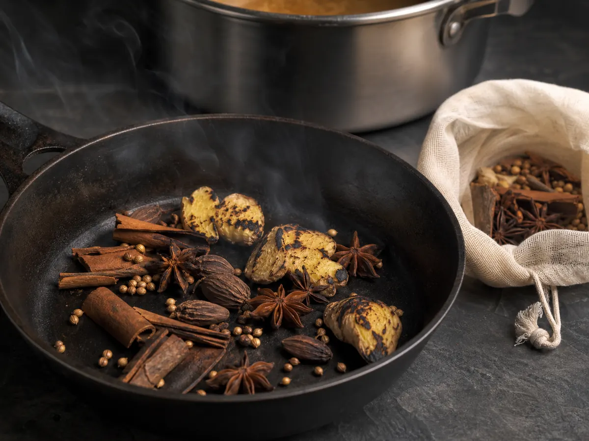 Star anise, cinnamon, black cardamom, coriander, and charred ginger toasted for pho broth - Vietnamese spices | KnowTheSpices
